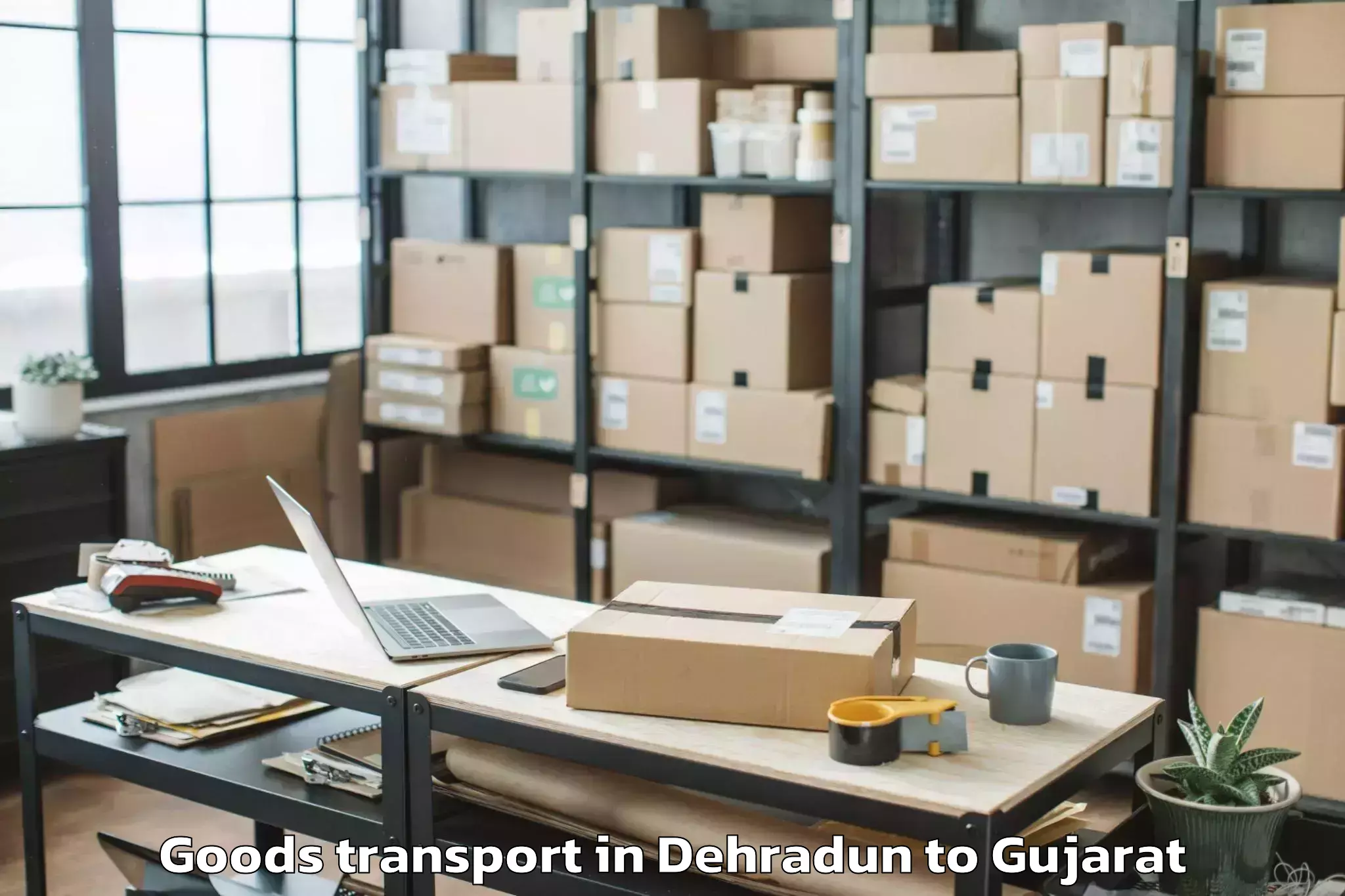 Discover Dehradun to Indus University Ahmedabad Goods Transport